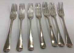 A set of seven Georgian silver "Old English" pattern dessert forks,