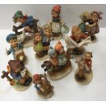 A collection of ten Goebal Hummel figures including "Auf Wiedersehen", "Barnyard hero",