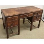 A 1920s mahogany kneehole desk,