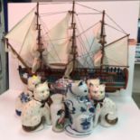 A wooden model of HMS Endeavour in full rigging 57 cm high x 70 cm long together with a collection