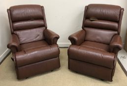 A pair of Sherborne brown leather covered reclining armchairs,