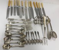 A collection of silver cutlery comprising two Victorian "Fiddle" pattern tablespoons (by Joseph and