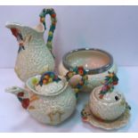 A collection of five pieces of Clarice Cliff Newport Pottery Celtic harvestware including baluster