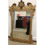 An early 18th Century parcel gilt framed wall mirror,