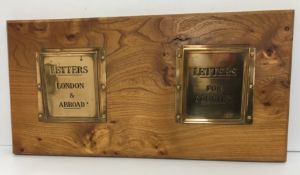 A pair of elm mounted brass "Letter pockets/racks" one inscribed "Letters London and Abroad",