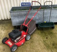 A Countax Sabre Nineteen lawnmower with Briggs & Stratton Quantum 35 petrol engine and a seed