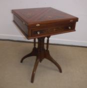A modern Continental marquetry inlaid envelope card table with single frieze drawer on cluster