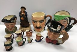 A box containing a Fieldings musical character jug of 