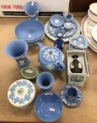 A collection of Wedgwood Jasperware to include teapot, pair of trumpet shaped vases, bowls,