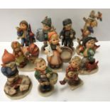 A collection of ten Goebal Hummel figures including "Here ye, here ye", "Culprits", "For Father",