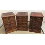 Three reproduction mahogany two drawer filing cabinets as Georgian chests of four drawers,