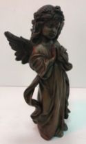 A modern bronze figure of a praying angel 30 cm high
