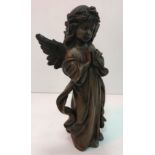 A modern bronze figure of a praying angel 30 cm high