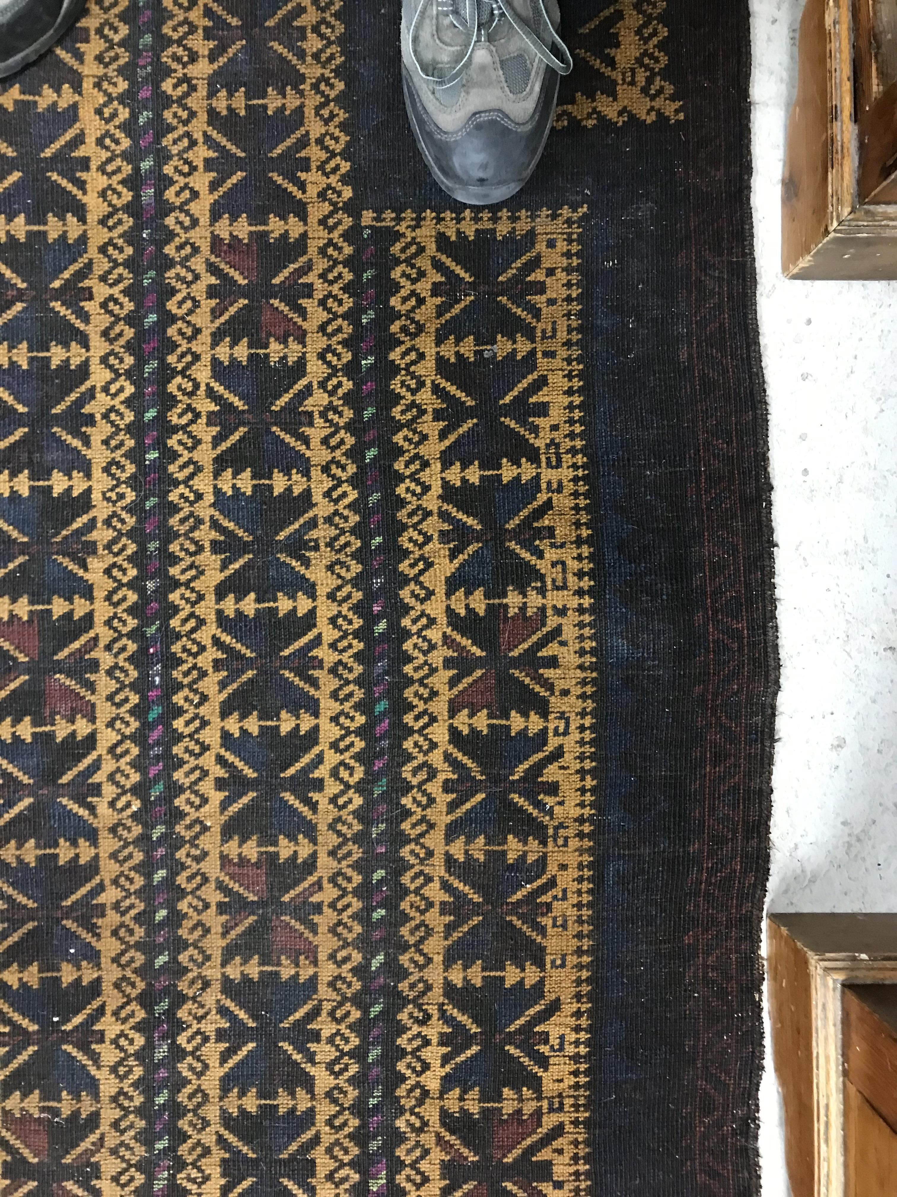 A Belouch prayer rug, the central panel set with geometric designs on a mustard ground, - Image 5 of 28