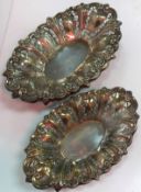 A graduated pair of Victorian pierced bonbon dishes of oval form (by Martin, Hall & Co,