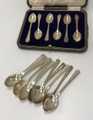 A set of eleven silver teaspoons (by Barker Brothers Silver Ltd, Birmingham 1939),