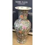 A Chinese famille rose style floor vase of baluster form with all-over floral decoration,