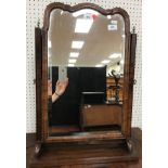 A walnut framed dressing mirror in the early 18th Century manner,