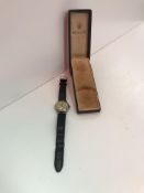 A mid 20th Century Rolex watch,