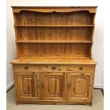 A 20th Century pine dresser,