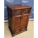 A pair of 20th Century oak display cabinets in the Old Charm manner,