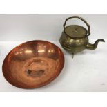 A copper bowl with hammered decoration, inscribed "LRI Borrowdale" hand-beaten to base,