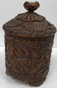 A 19th Century Norwegian carved acanthus decorated cylindrical pot and cover (probably tea caddy),