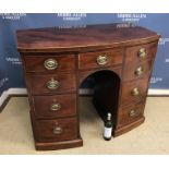 A 19th Century mahogany and inlaid Sheraton Revival bow fronted sideboard,