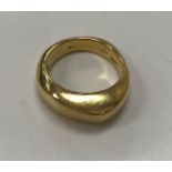 An 18 carat gold ring with tapered top 14.