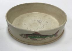 A 19th Century pottery char dish of shallow cylindrical form with printed fish decoration and