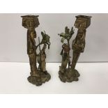 A pair of Austrian cold painted bronze figural candlesticks,