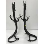 A pair of modern cast bronze dragon models each 41 cm high