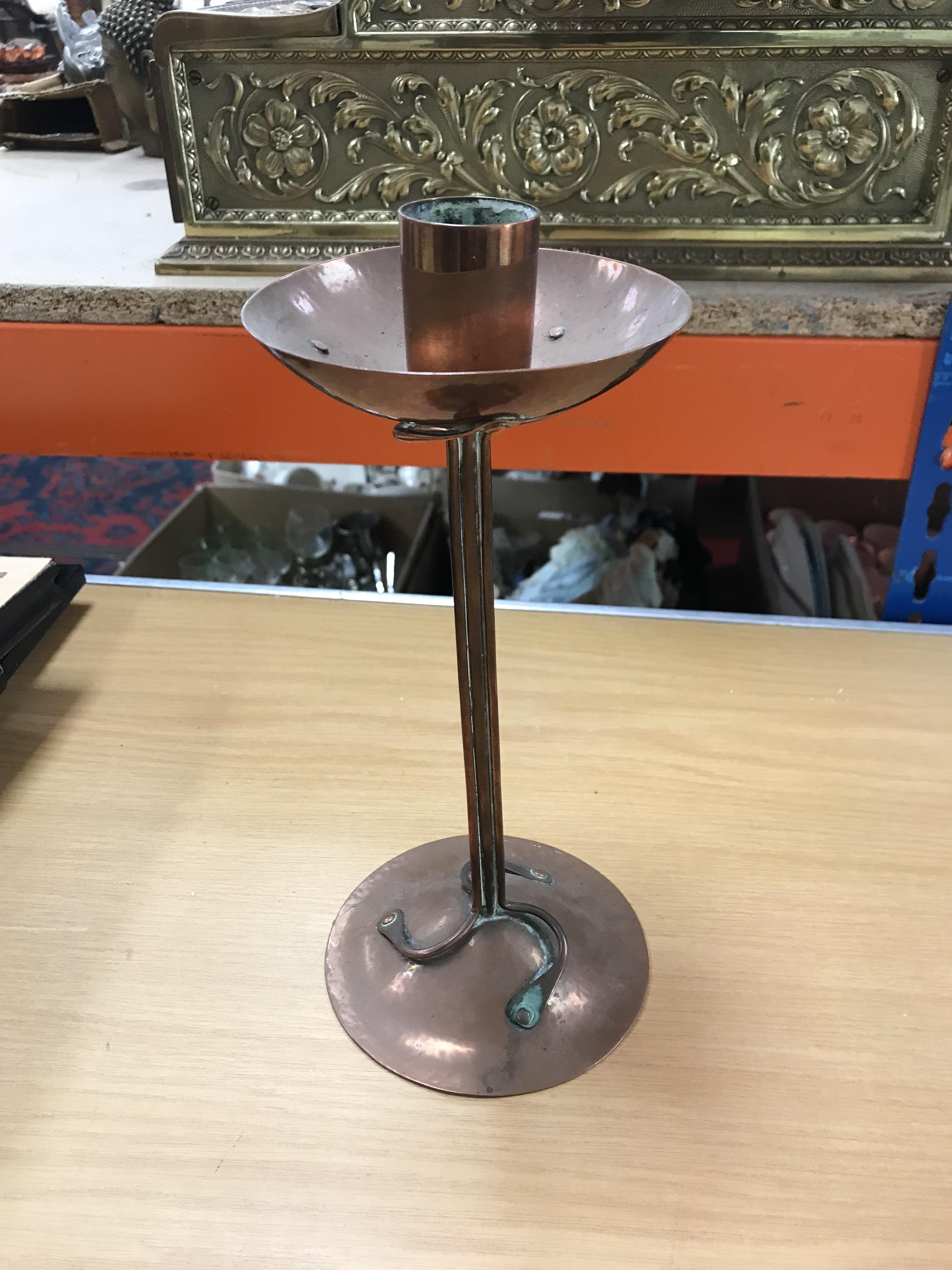 A collection of early 20th Century copper and brass ware comprising a copper candlestick with - Image 49 of 50