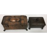 An Arts & Crafts copper and brass mounted hinge-lidded tea caddy of square tapering form with domed