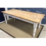 A modern pine and painted farmhouse style kitchen table in the Victorian manner,