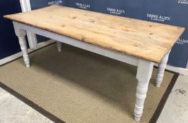 A modern pine and painted farmhouse style kitchen table in the Victorian manner,