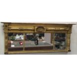 A 19th Century gilt and gesso framed triple plate over mantel wall mirror with central shell