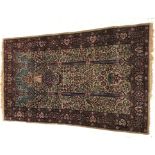 An Oriental prayer rug of Mihrab style design,