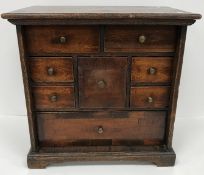 A 19th Century oak and walnut table top chest,