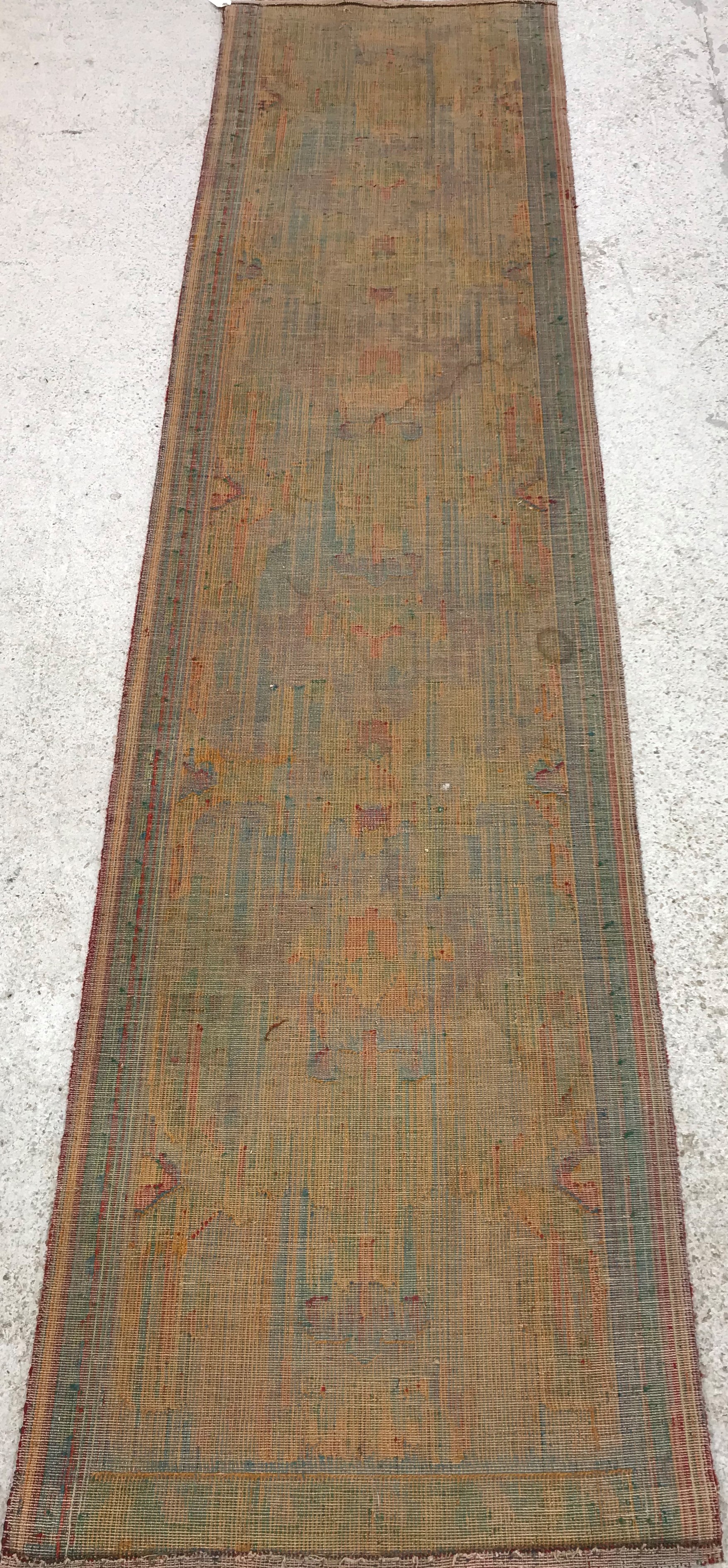 A Donegal type machine woven runner set with repeating geometric style design on a red ground, - Image 21 of 26