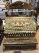 A cast brass cased National cash register No. 55, serial No.