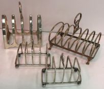 A George V silver four section toast rack of arched form (by Emile Viner,
