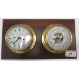 A Kelvin Hughes mahogany mounted barometer thermometer and clock, both with brass mounts,