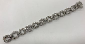 An Art Deco style white metal and old cut diamond set bracelet, total carat weight approx. 7.01, 18.