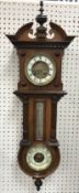 A circa 1900 walnut cased Vienna style eight day wall clock with mercury thermometer and aneroid