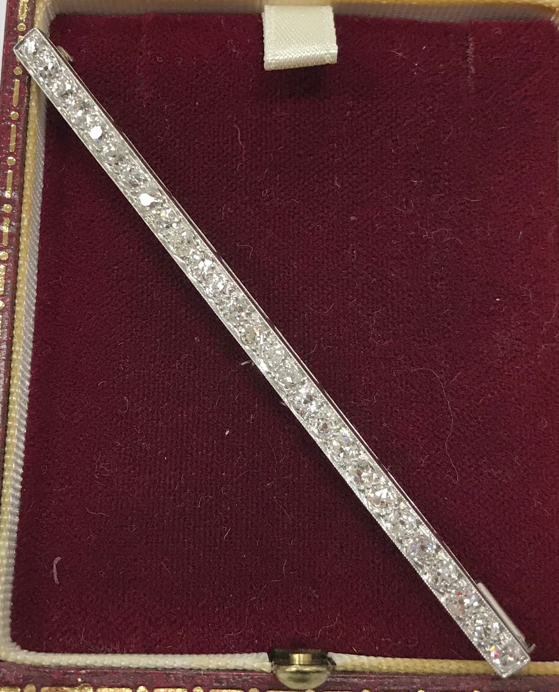 An early 20th Century white metal mounted old cut diamond set bar brooch with 27 stones approximate - Image 4 of 4