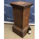 An early 20th Century painted faux marble pedestal of rectangular form 40 cm wide x 43 cm deep x 92