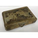 A brass playing cards casket with wood inlaid decoration depicting knights in battle and archer in