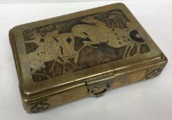 A brass playing cards casket with wood inlaid decoration depicting knights in battle and archer in