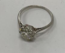 An early 20th Century platinum mounted mine cut diamond single stone ring,
